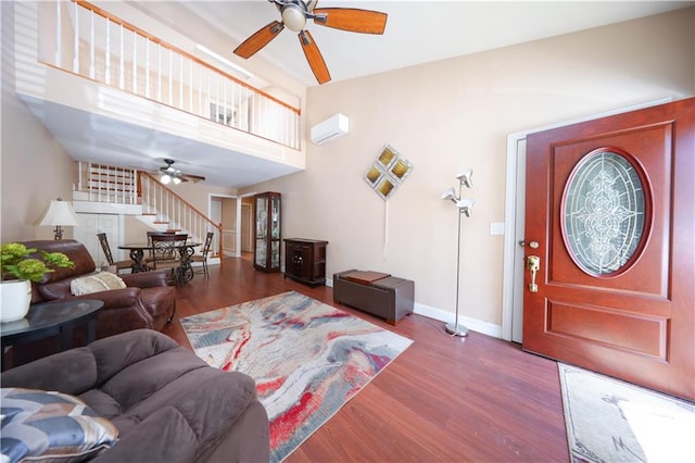 177 Russek Dr Unit 1, Staten Island, NY 10312 - living room with a ceiling fan, stairs, wood finished floors, and baseboards