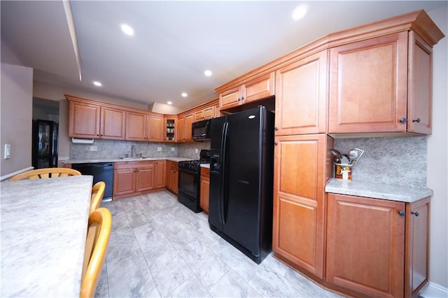 177 Russek Dr Unit 1, Staten Island, NY 10312 - kitchen with black appliances, a sink, light countertops, tasteful backsplash, and recessed lighting