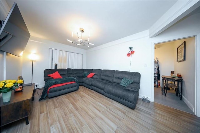 1711 Bay Ridge Parkway, Brooklyn, NY 11204 - living room featuring wood finished floors, a chandelier, and baseboards
