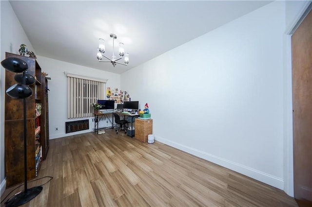 1711 Bay Ridge Parkway, Brooklyn, NY 11204 - home office featuring a chandelier, wood finished floors, and baseboards