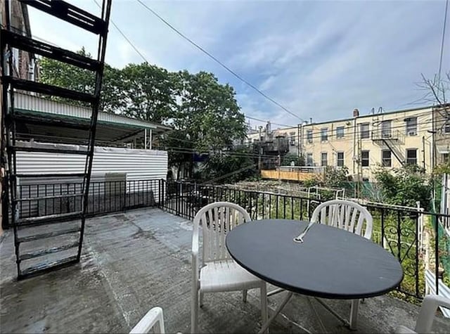 1711 Bay Ridge Parkway, Brooklyn, NY 11204 - view of patio / terrace with a balcony and outdoor dining space