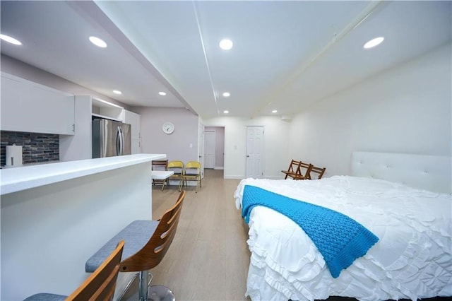 1711 Bay Ridge Parkway, Brooklyn, NY 11204 - bedroom featuring freestanding refrigerator, recessed lighting, and light wood finished floors
