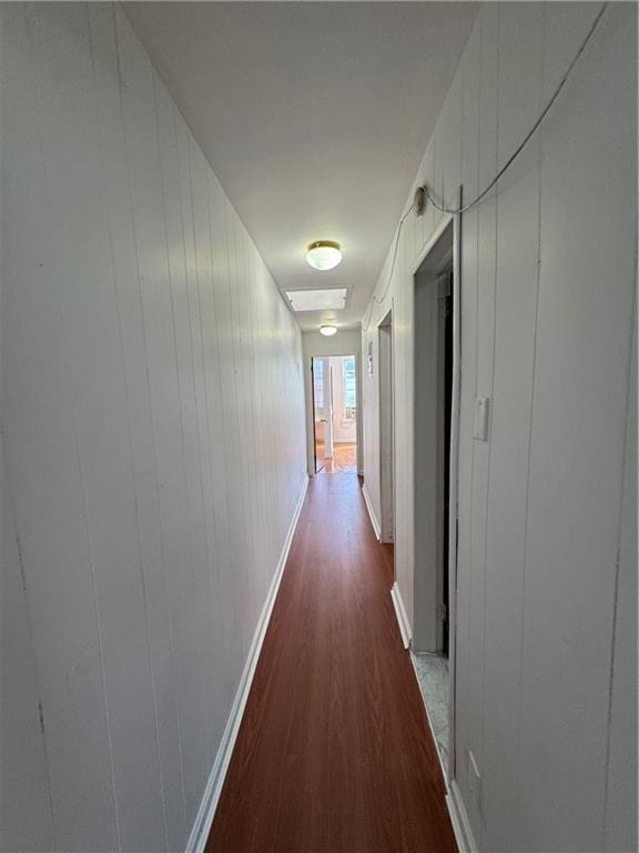 1414 76th St, Brooklyn, NY 11228 - corridor featuring dark wood finished floors and baseboards