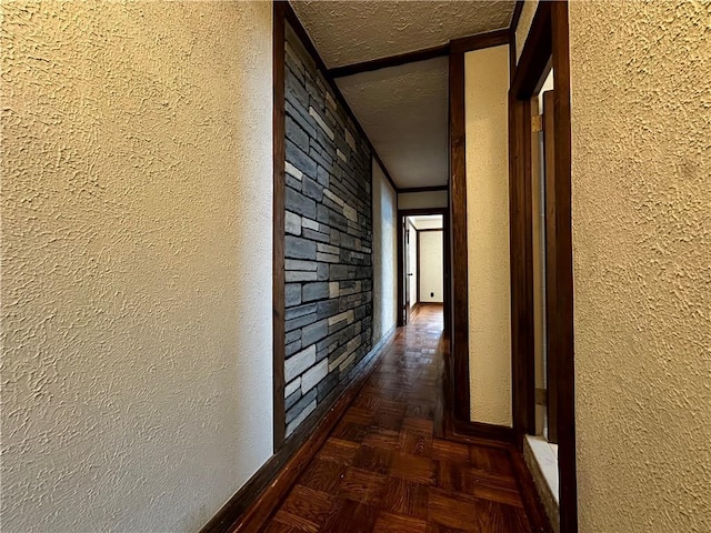 974 77th St, Brooklyn, NY 11228 - hallway with a textured wall, baseboards, and a textured ceiling