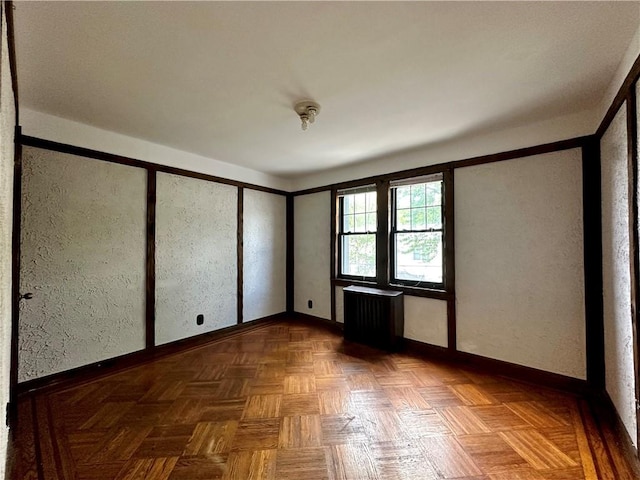 974 77th St, Brooklyn, NY 11228 - spare room with radiator heating unit and baseboards