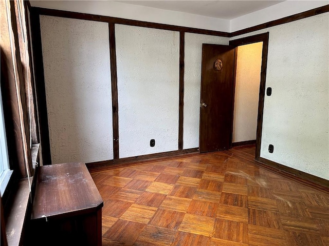 974 77th St, Brooklyn, NY 11228 - spare room featuring baseboards and a textured wall