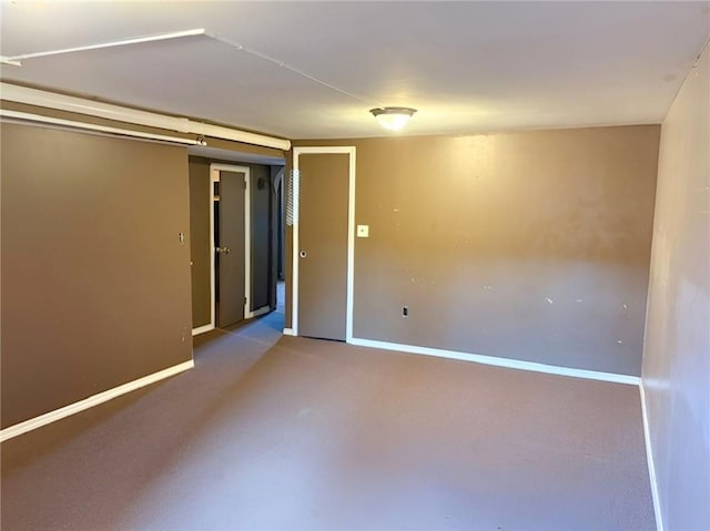 2315 E 17th St, Brooklyn, NY 11229 - empty room with baseboards and carpet
