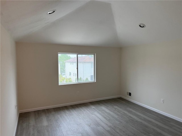 7 Georgetown Ln, Brooklyn, NY 11234 - empty room with wood finished floors, lofted ceiling, and baseboards