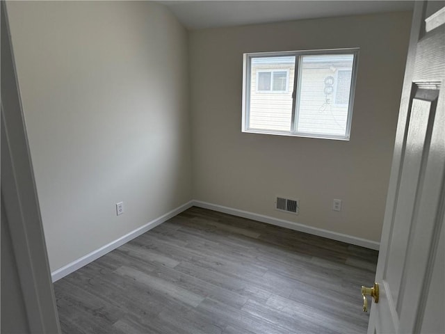 7 Georgetown Ln, Brooklyn, NY 11234 - empty room with wood finished floors and baseboards