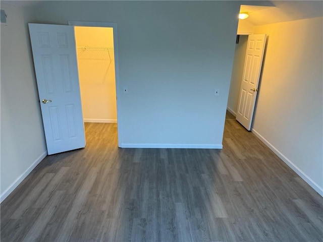 7 Georgetown Ln, Brooklyn, NY 11234 - unfurnished room with dark wood-style flooring and baseboards