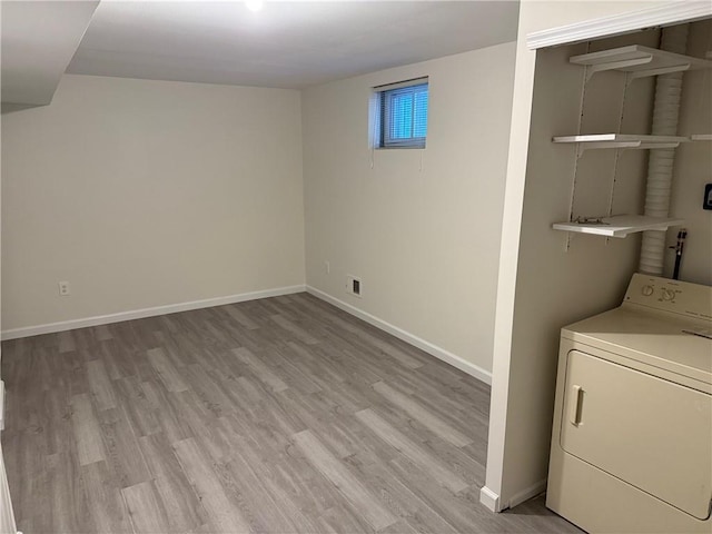 7 Georgetown Ln, Brooklyn, NY 11234 - washroom featuring washer / dryer, light wood-style flooring, and baseboards