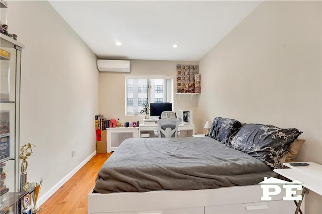 2077 Hendrickson St, Brooklyn, NY 11234 - bedroom featuring a wall mounted AC, wood finished floors, recessed lighting, and baseboards