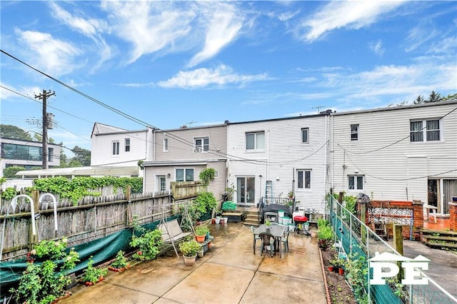 2077 Hendrickson St, Brooklyn, NY 11234 - rear view of house featuring a patio area
