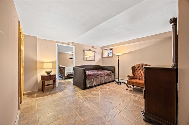 680 81st St Unit 1B, Brooklyn, NY 11228 - bedroom featuring a baseboard radiator, baseboards, and light tile patterned floors