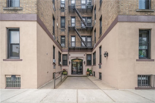 680 81st St Unit 1B, Brooklyn, NY 11228 - property entrance with stucco siding and french doors