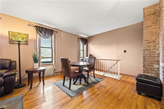 680 81st St Unit 1B, Brooklyn, NY 11228 - dining area with light wood-style flooring and baseboards