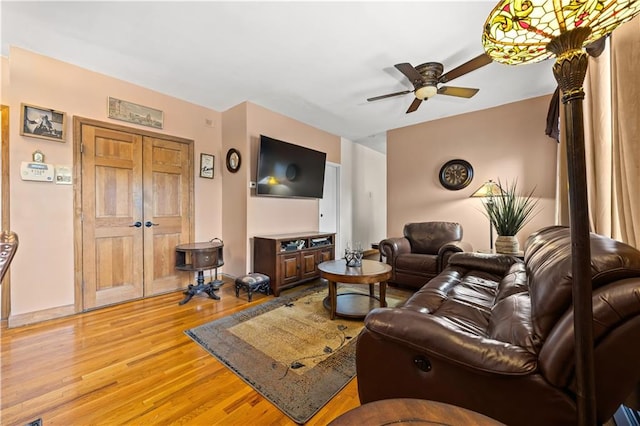 680 81st St Unit 1B, Brooklyn, NY 11228 - living room with ceiling fan, light wood-style flooring, and baseboards