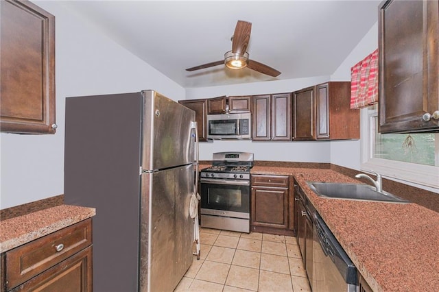 47 Center Pl, Staten Island, NY 10306 - kitchen featuring stainless steel appliances, a sink, a ceiling fan, light tile patterned floors, and dark brown cabinetry