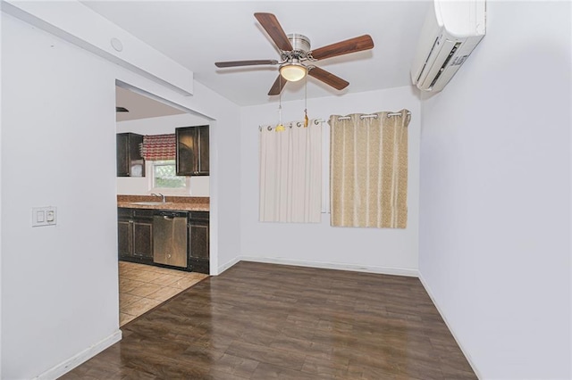 47 Center Pl, Staten Island, NY 10306 - empty room featuring an AC wall unit, ceiling fan, a sink, wood finished floors, and baseboards