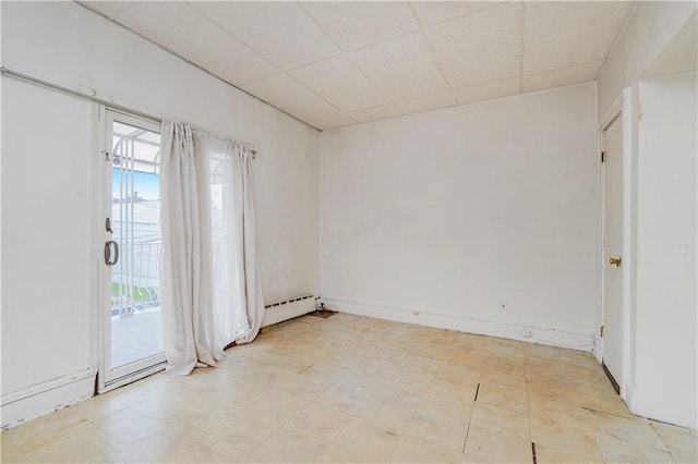 2424 W 3rd St, Brooklyn, NY 11223 - spare room with healthy amount of natural light and a drop ceiling