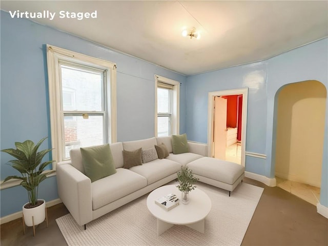 1685 E 2nd St, Brooklyn, NY 11223 - living room featuring baseboards