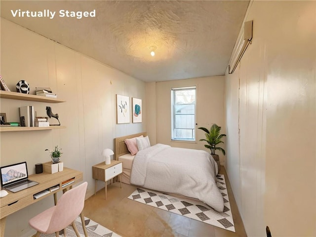 1685 E 2nd St, Brooklyn, NY 11223 - bedroom featuring a textured ceiling and a desk