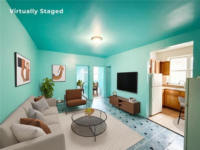 1685 E 2nd St, Brooklyn, NY 11223 - living area with light tile patterned floors