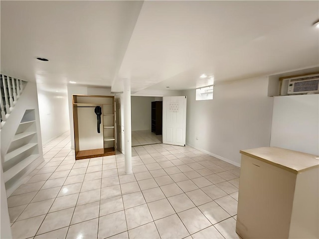 1685 E 2nd St, Brooklyn, NY 11223 - spare room featuring stairway, an AC wall unit, and light tile patterned floors