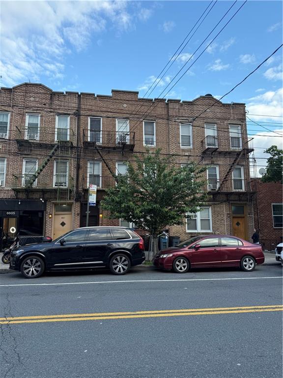6609 13th Ave, Brooklyn, NY 11219 - view of front of home with brick siding