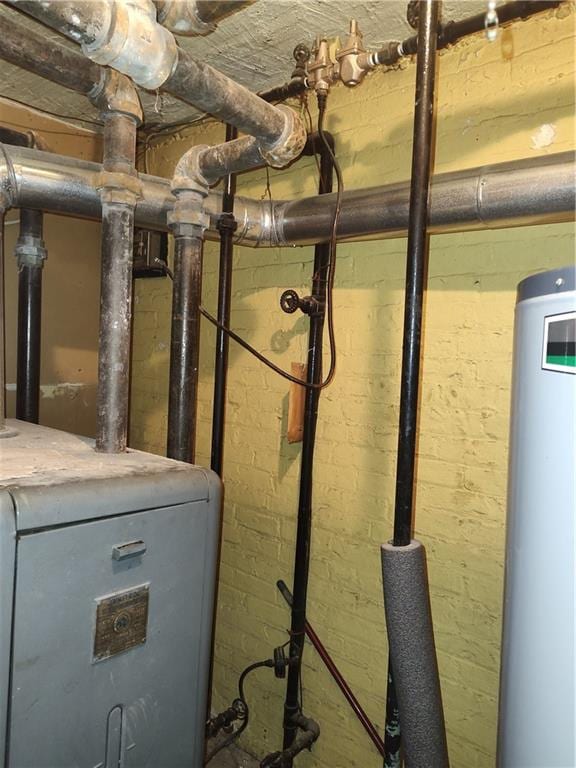 324 E 26th St, Brooklyn, NY 11226 - utility room with water heater