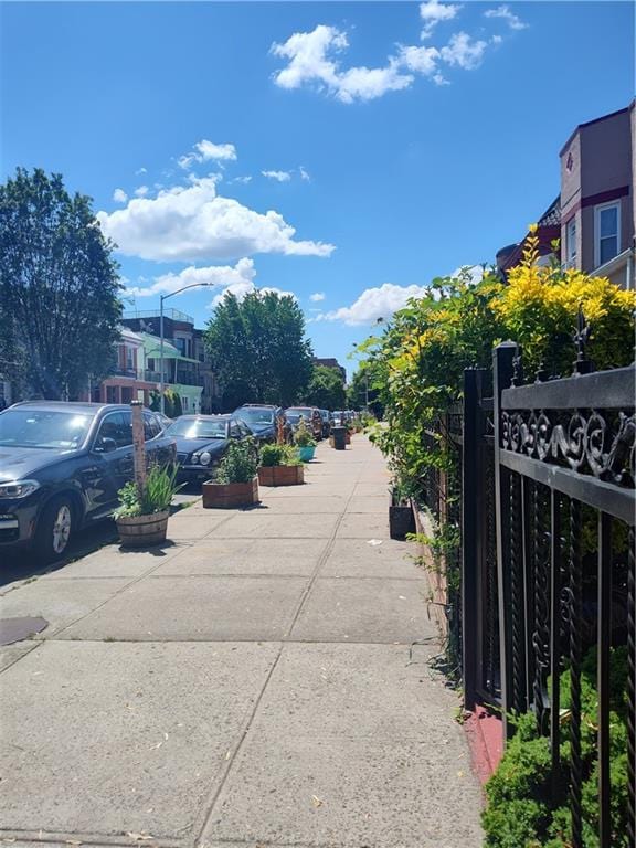 324 E 26th St, Brooklyn, NY 11226 - view of concrete road featuring street lights