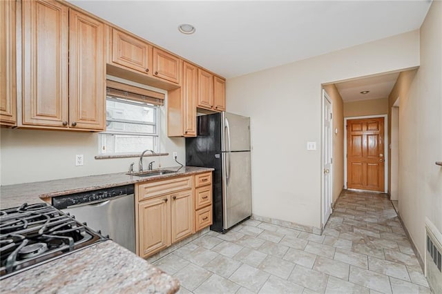 1325 82nd St, Brooklyn, NY 11228 - kitchen featuring a sink, appliances with stainless steel finishes, and light stone countertops