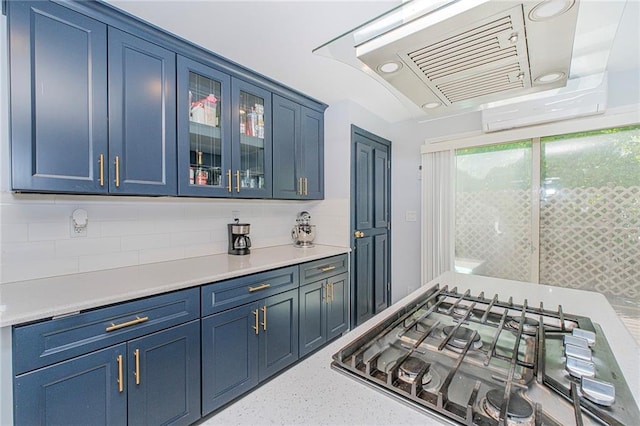 4 Lisa Ln, Staten Island, NY 10312 - kitchen featuring stainless steel gas stovetop, blue cabinets, range hood, and light countertops