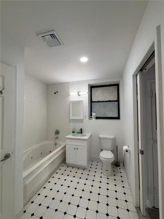 555 W 149th St Unit 4, New York, NY 10031 - bathroom with tile patterned floors, vanity, and a tub with jets