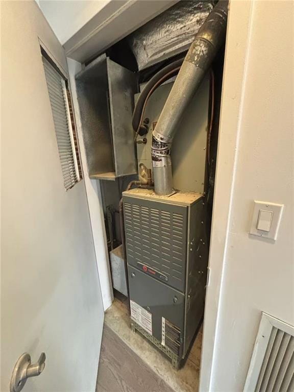 555 W 149th St Unit 4, New York, NY 10031 - utility room with heating unit