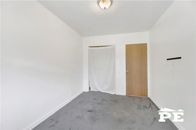 5709 Fillmore Ave, Brooklyn, NY 11234 - unfurnished bedroom featuring carpet flooring, baseboards, and a closet