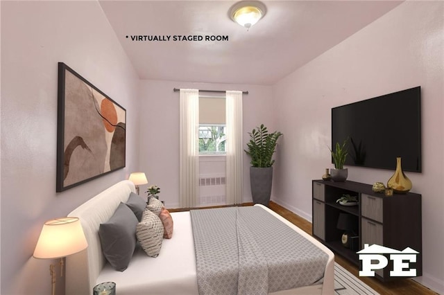 5709 Fillmore Ave, Brooklyn, NY 11234 - bedroom with wood finished floors and baseboards