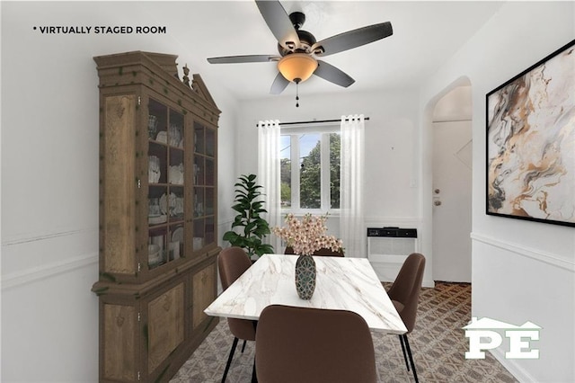 5709 Fillmore Ave, Brooklyn, NY 11234 - dining room with arched walkways and a ceiling fan