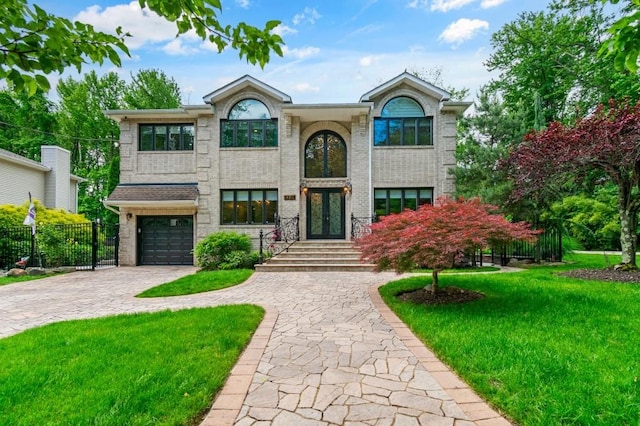 476 Hargold Ave, Staten Island, NY 10309 - view of front of home featuring french doors, decorative driveway, an attached garage, and brick siding