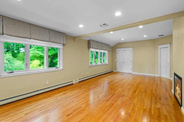 476 Hargold Ave, Staten Island, NY 10309 - unfurnished room featuring a baseboard heating unit, light wood-style flooring, recessed lighting, baseboards, and lofted ceiling