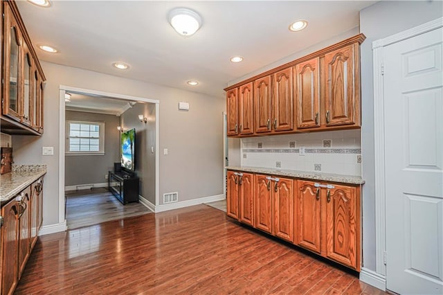 39 Morton St, Staten Island, NY 10306 - kitchen with dark wood finished floors, glass insert cabinets, decorative backsplash, baseboards, and recessed lighting