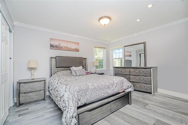 39 Morton St, Staten Island, NY 10306 - bedroom with ornamental molding, baseboards, light wood-style flooring, recessed lighting, and a closet