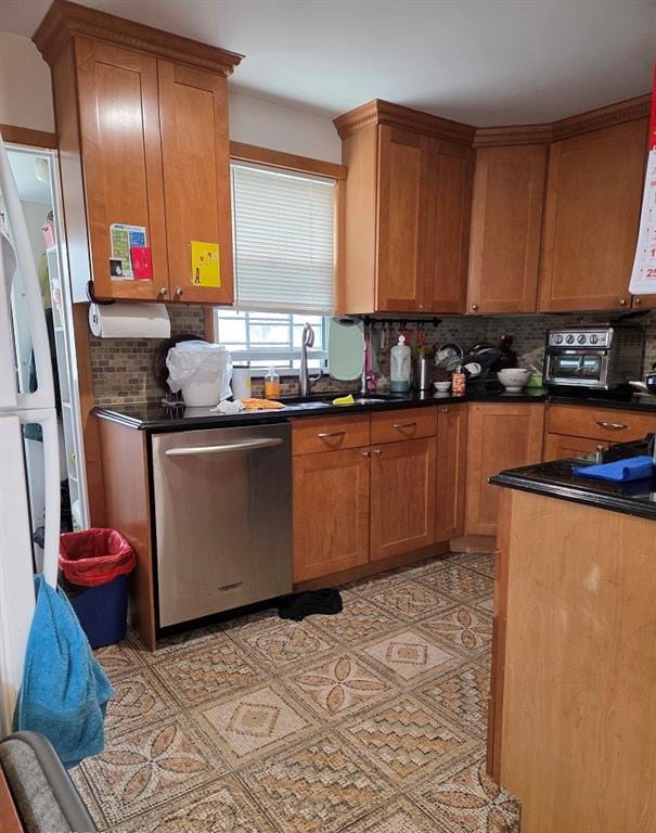 1711 E 36th St, Brooklyn, NY 11234 - kitchen with dishwasher, a sink, tasteful backsplash, and brown cabinetry