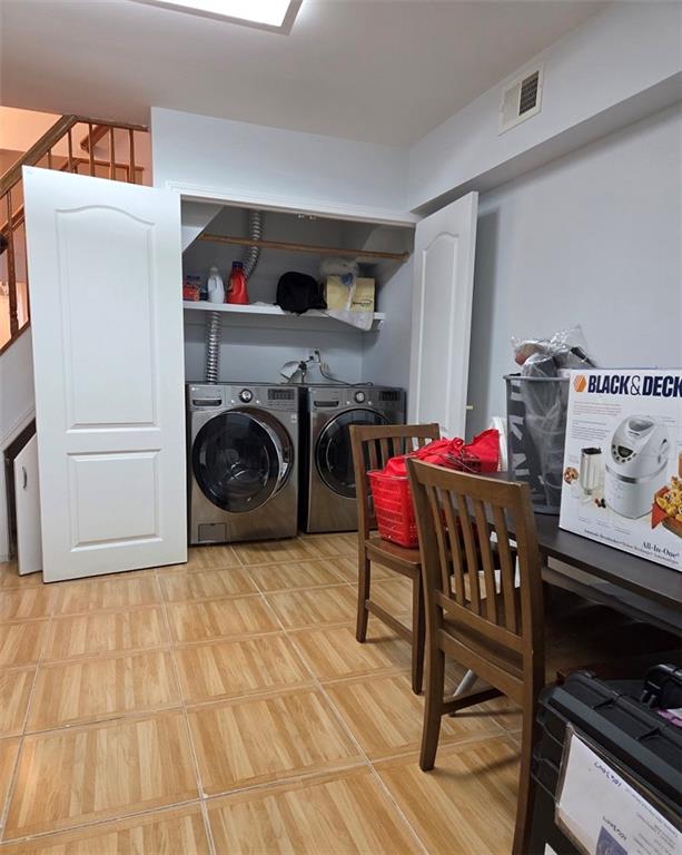 1711 E 36th St, Brooklyn, NY 11234 - washroom featuring washer and clothes dryer