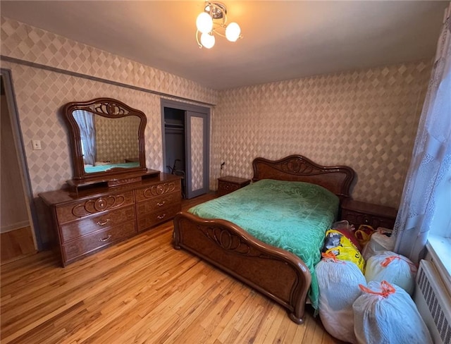 1811 Ocean Pkwy Unit 6-L, Brooklyn, NY 11223 - bedroom with wallpapered walls and light wood-style flooring