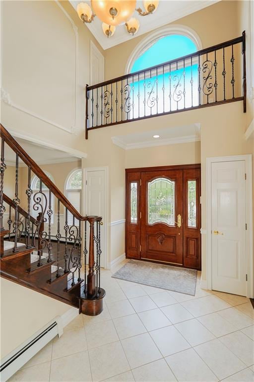 237 Swinnerton St, Staten Island, NY 10307 - tiled foyer featuring a baseboard radiator, a high ceiling, stairway, a chandelier, and baseboards