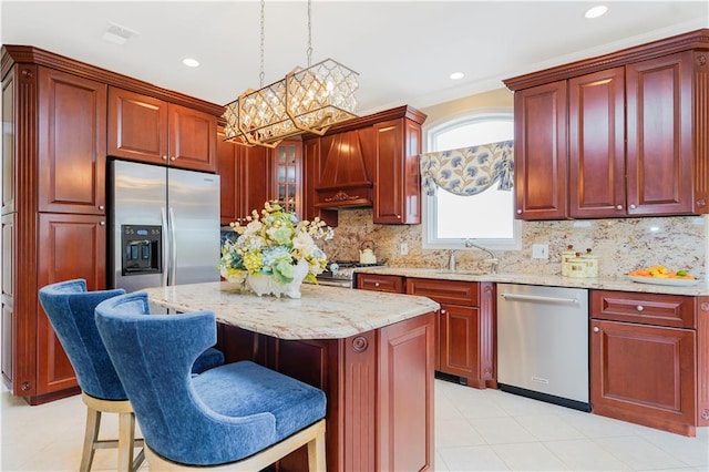 237 Swinnerton St, Staten Island, NY 10307 - kitchen with stainless steel appliances, a sink, a chandelier, dark brown cabinets, and recessed lighting