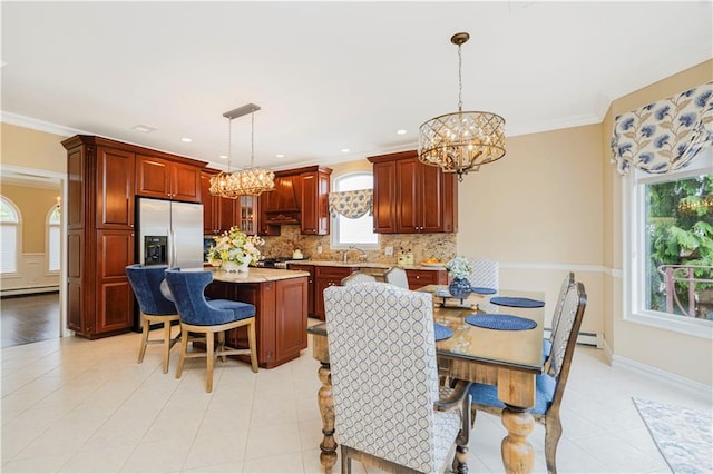 237 Swinnerton St, Staten Island, NY 10307 - kitchen featuring a chandelier, tasteful backsplash, a sink, stainless steel refrigerator with ice dispenser, and pendant lighting