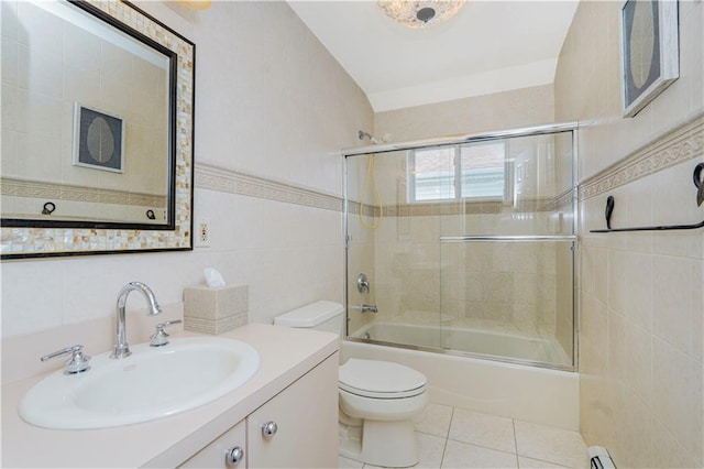 237 Swinnerton St, Staten Island, NY 10307 - full bath featuring tile walls, toilet, shower / bath combination with glass door, vanity, and tile patterned flooring