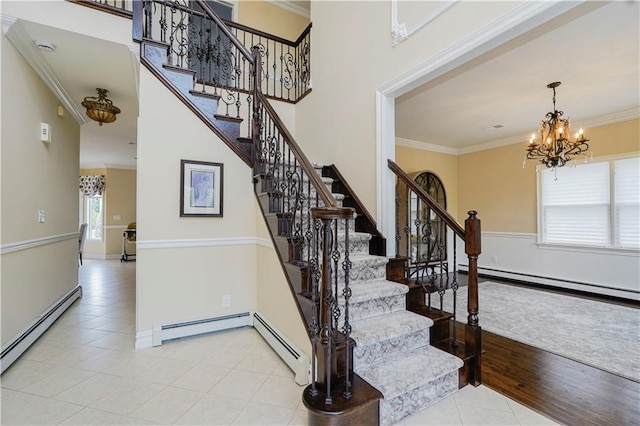 237 Swinnerton St, Staten Island, NY 10307 - stairway featuring baseboard heating, ornamental molding, a baseboard radiator, a chandelier, and tile patterned flooring